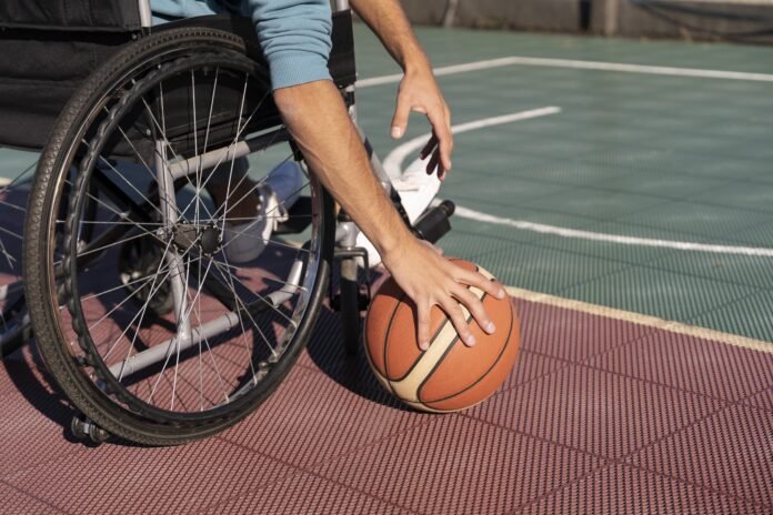 close-up-disabled-person-holding-ball-min