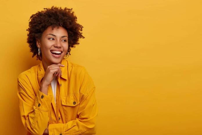 african-woman-with-natural-beauty-carefree-expression-looks-aside-has-happy-friendly-attitude(1)